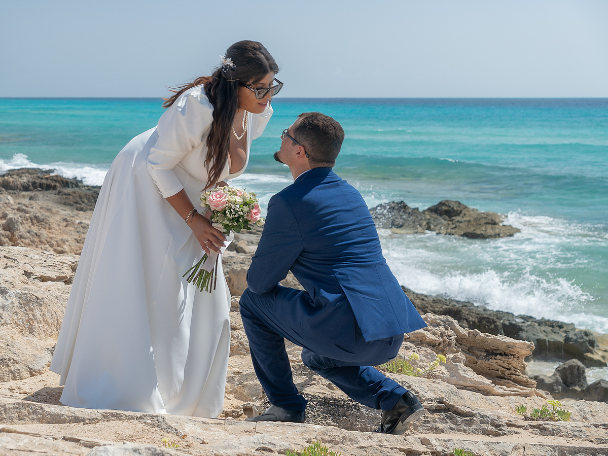 Couple on the coast at sunset, wedding photographer Ibiza and Formentera